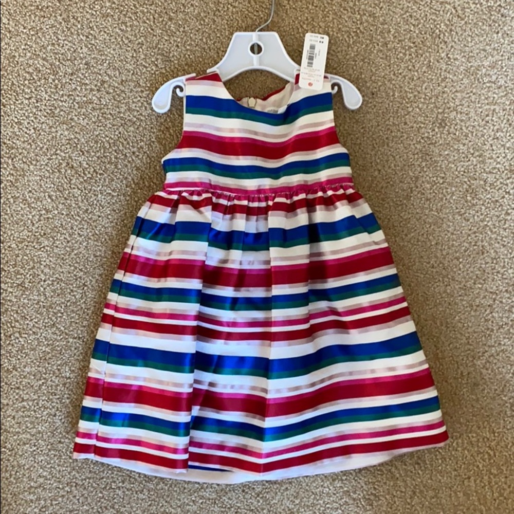 Red, blue, pink and green striped holiday dress.